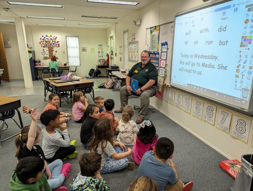 Thursday, Jan. 25 was a special day for us at Everglades Elementary as we surprise the kids with their "Special Surprise Guest Readers". Sheriff Noel Stephen, Major Michael Hazellief (along with K-9 Angel), Civil Clerk Denise Sikorski, Sgt. Jack Nash and Sgt. Heath Hughes made the surprise visit and enjoyed reading with some really excited kids. 
We extend a special thank you to SRO Deputy Tim Higgins and all the Everglades Elementary staff, especially Mrs. Jenna Peterson (her banana bread), for always making us feel welcome and invited.