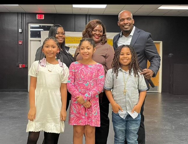 The winners for grades 3-5. Front row from left to right are Layla Rodriguez, Arabella Manuel, and King Green. Back row, from left to right, are RES Resource Teacher Shamekia Camel, RES Assistant Principal Sonya Green, and RES Principal Bruce Hightower.