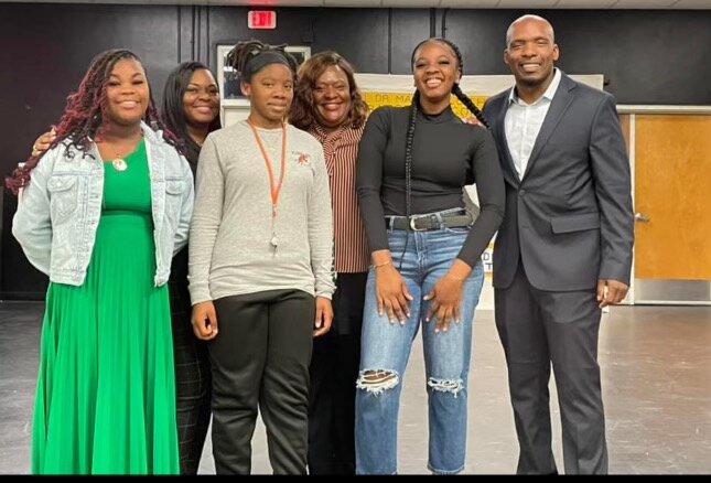 The winners for grades 9-12. From left to right are Persia Green, RES Resource Teacher Shamekia Camel, Jada Lovely, RES Assistant Principal Sonya Green, Precious Vickers, and RES Principal Bruce Hightower.