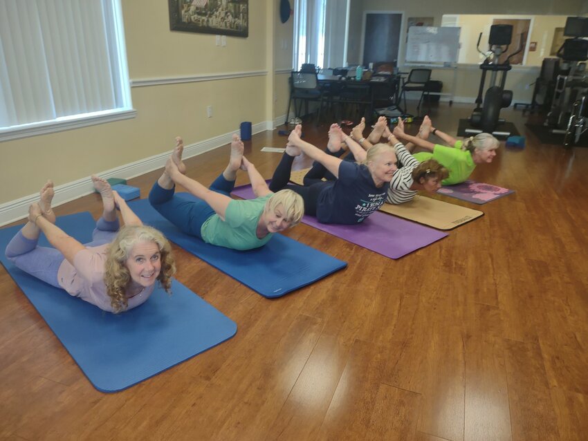 The Yoga practioners pictured are from Shield Wellness Center, Sebring, 4597 Casablanca Circle: Joyce Shafer, Ineta Witmill, Lori Melton, Elizabeth Barrios, and Nancy Petersen demonstrating their body sculpting. (Photo courtesy Nancy Dale)