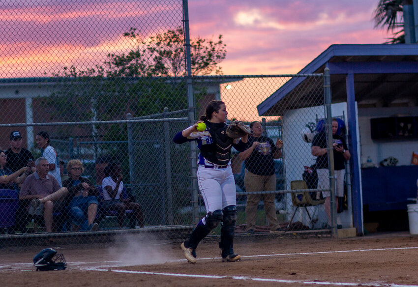 Rylie Tucker guards home plate for Okeechobee. [Photo by Richard Marion]