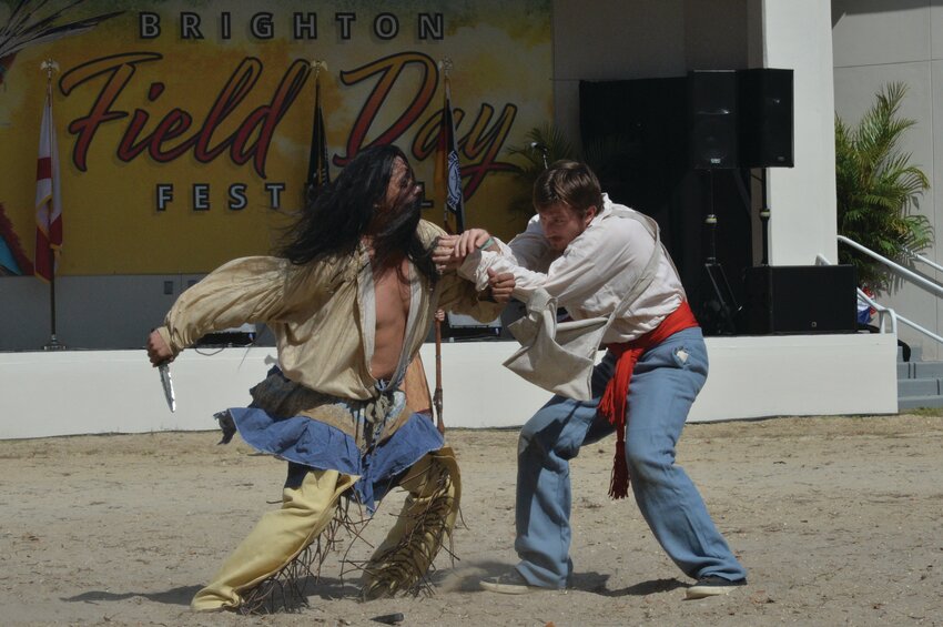 Hand to hand combat techniques used during the Seminole Wars were demonstrated by the Osceola Warrior Legacy group at the 2024 Brighton Seminole Field Day Festival. [Photo by Katrina Elsken/Lake Okeechobee News]
