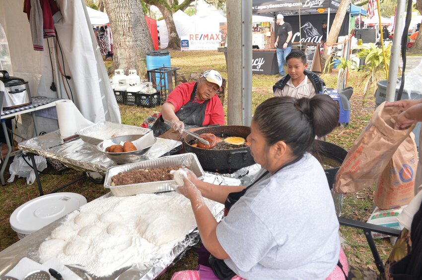 LABELLE -- Fry bread preparation was underway in a booth at the 2024 Swamp Cabbage Festival in LaBelle. [Photo by Katrina Elsken/Caloosa Belle Independent]