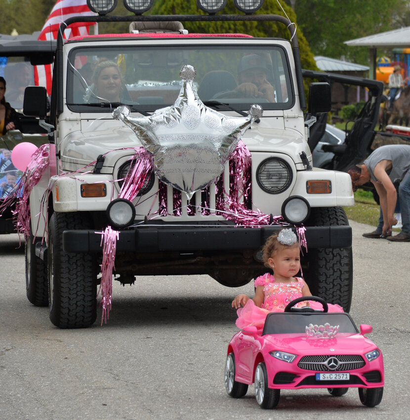 MOORE HAVEN -- Baby Miss Chalo NItka Willow Rose Green had her own convertible in the 2024 Chalo Nitka Festival Parade. [Photo by Katrina Elsken/Lake Okeechobee News]
