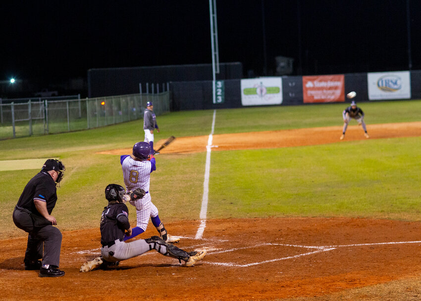 Ethan Blomefield hits a line drive to centerfield. [Photo by Richard Marion/Lake Okeechobee News]
