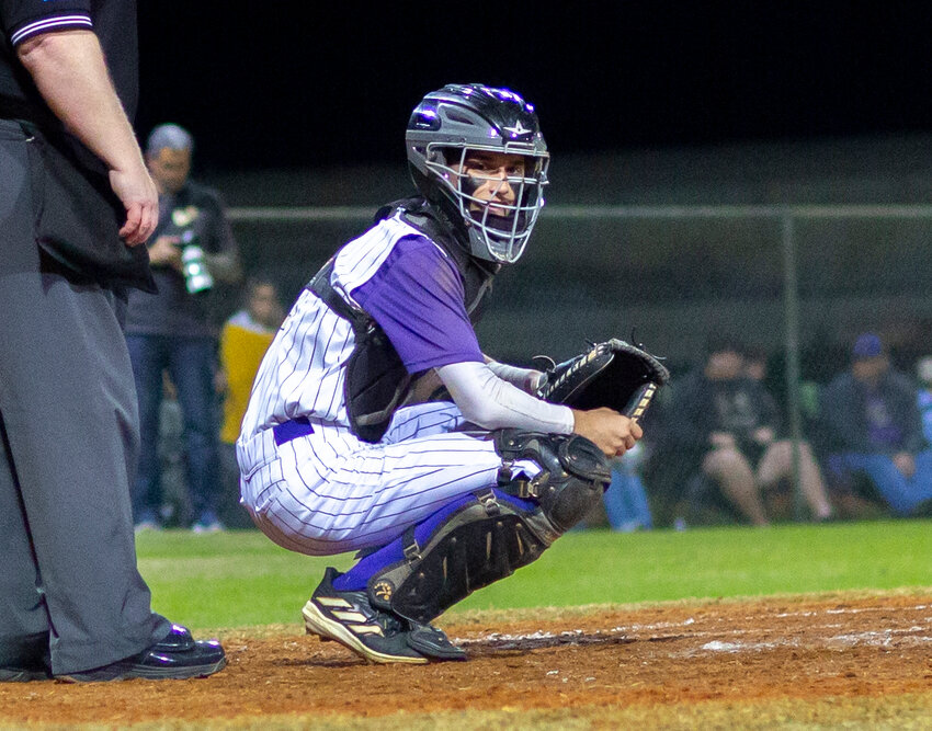 Mason Kindell looks to the Brahman dugout for the next pitch call. [Photo by Richard Marion/Lake Okeechobee News]
