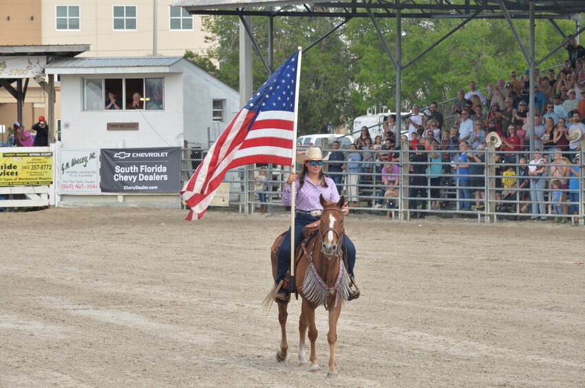 OKEECHOBEE -- The Cowtown Rodeo included an inspiring tribute to the flag on Saturday.
