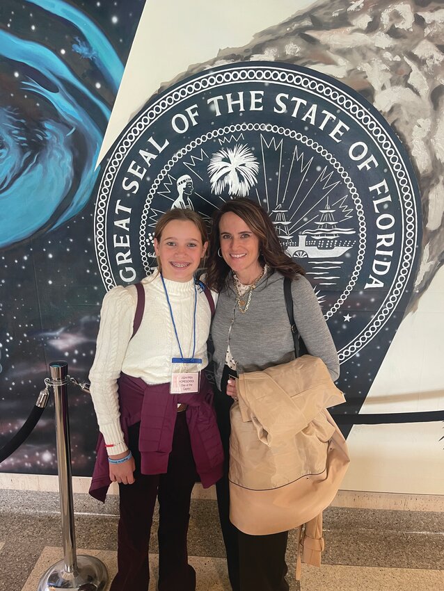 Melinda Wherrell is involved in the fight for parental rights. Here, she is pictured with her daughter Olivia at the state capitol..[Photo courtesy Melinda Wherrell]