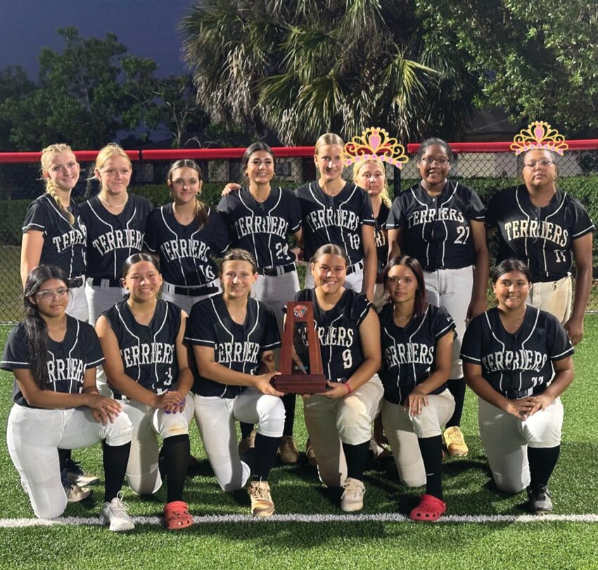 The Lady Terriers with their regional runners-up trophy. (Photo courtesy Mona Baker/Lake Okeechobee News)