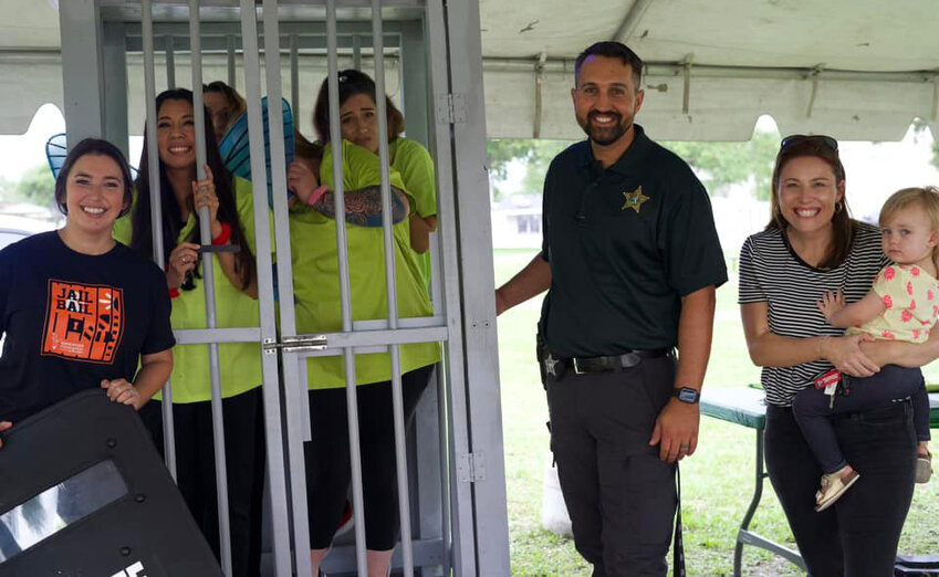 The girls from the Sacred Lounge Spa await their release on bail at the 2024 Jail and Fundraiser. (Photo courtesy Education Foundation of Okeechobee/Lake Okeechobee News)