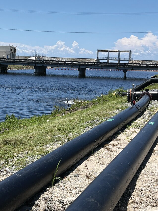OKEECHOBEE -- Water that has been cleaned by the NuQuatic project is released back into the canal. [Photo by Katrina Elsken/Lake Okeechobee News]