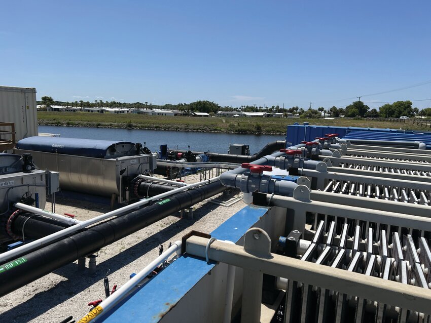 OKEECHOBEE -- Water from the canal is pumped through a filter system (at left) to remove sediment before it goes into the tanks where the galvanic process takes place. [Photo by Katrina Elsken/Lake Okeechobee News]