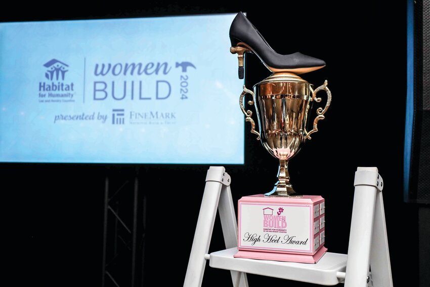 Women Build High Heel Award fundraising trophy.