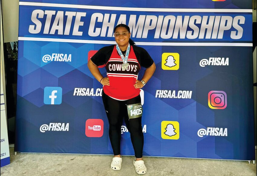 Aleah Baron with her fourth place medal at the Track and Field state championships. (Photo courtesy LHS/Hendry County News)