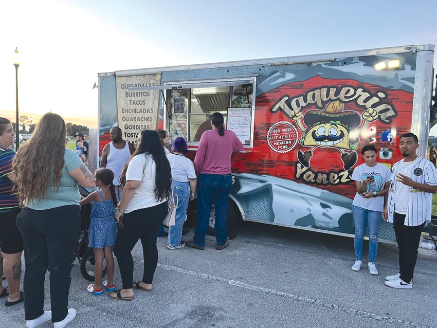 OKEECHOBEE -- Food trucks stayed busy at the community fireworks show at the Okeechobee Agri-Civic Center on July 6. [Photo by Katrina Elsken/Lake Okeechobee News]