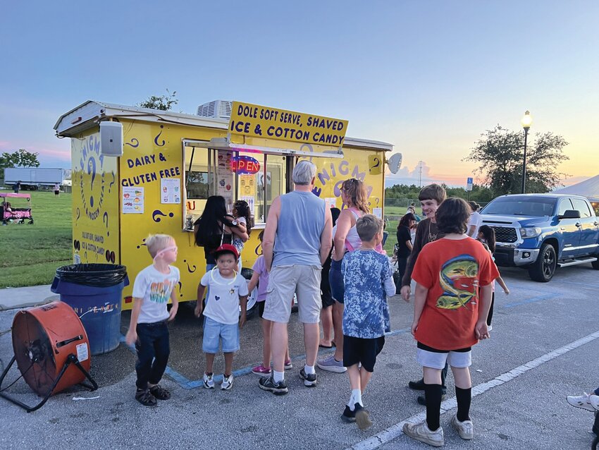 OKEECHOBEE -- Food trucks stayed busy at the community fireworks show at the Okeechobee Agri-Civic Center on July 6. [Photo by Katrina Elsken/Lake Okeechobee News]