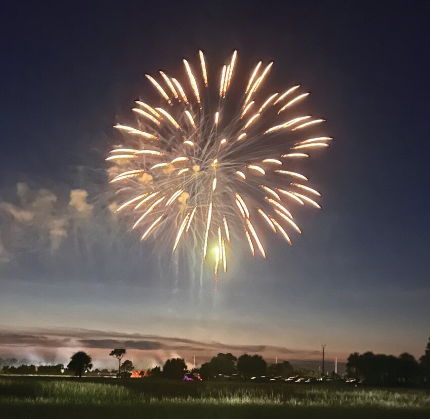 OKEECHOBEE -- Fireworks lit up the night sky above the Okeechobee Agri-Civic Center on July 6. [Photo by Katrina Elsken/Lake Okeechobee News]