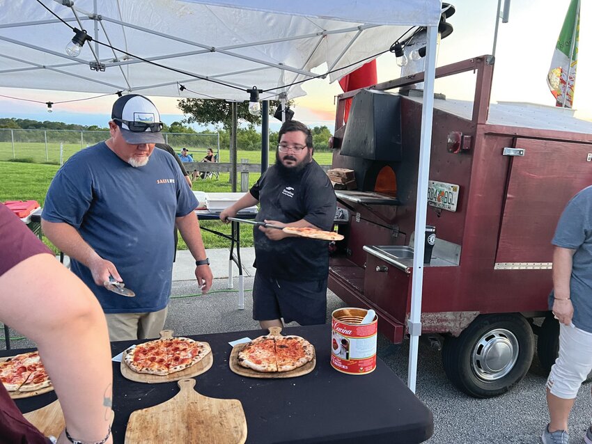 OKEECHOBEE -- Food trucks stayed busy at the community fireworks show at the Okeechobee Agri-Civic Center on July 6. [Photo by Katrina Elsken/Lake Okeechobee News]