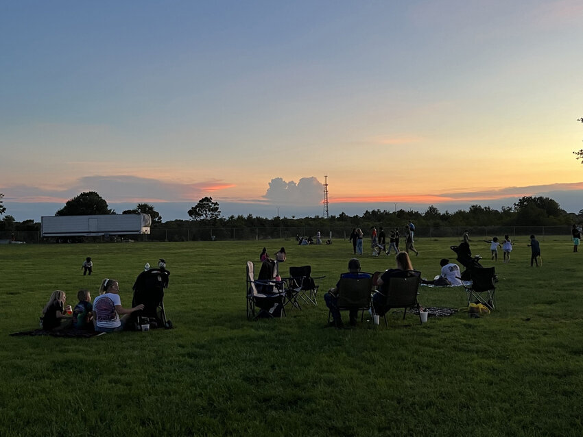 OKEECHOBEE -- Before the fireworks show, community members enjoyed the sunset. [Photo by Katrina Elsken/Lake Okeechobee News]