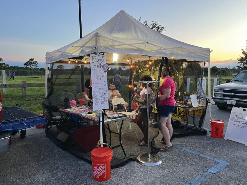 OKEECHOBEE -- Fairy Hair had a booth at the community fireworks show on July 6. [Photo by Katrina Elsken/Lake Okeechobee News]