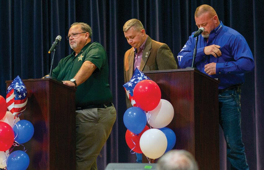 Sheriff Noel Stephen ignores a handshake from Jon Folbrecht before the Okeechobee County political forum. The tension between the candidates was palpable leading up to the forum after a summer full of political and personal attacks. [Photo by Richard Marion/Lake Okeechobee News]