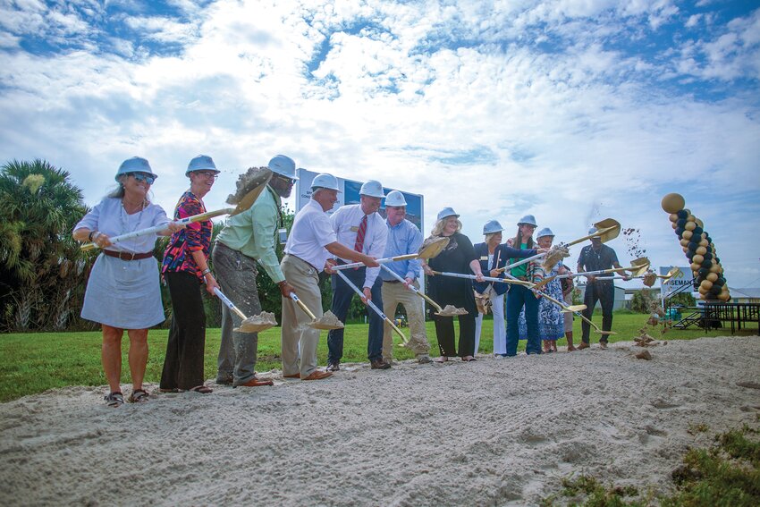 Members from the Glades County School District and Wiseman Construction officially break ground on the new Moore Haven Elementary. [Photo by Richard Marion/Lake Okeechobee News]