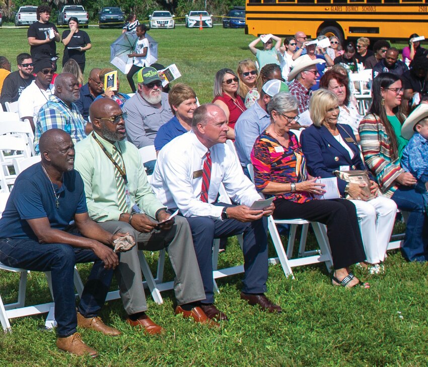 Deputy superintendent Brian Greseth listens as superintendent Dr. Alice Beth Barfield speaks at the new Moore Haven Elementary groundbreaking. [Photo by Richard Marin/Lake Okeechobee News]