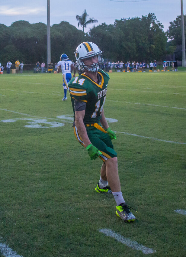 Glades Day's Caden McIntosh celebrates after a big tackle. [Photo by Richard Marion/Lake Okeechobee News]