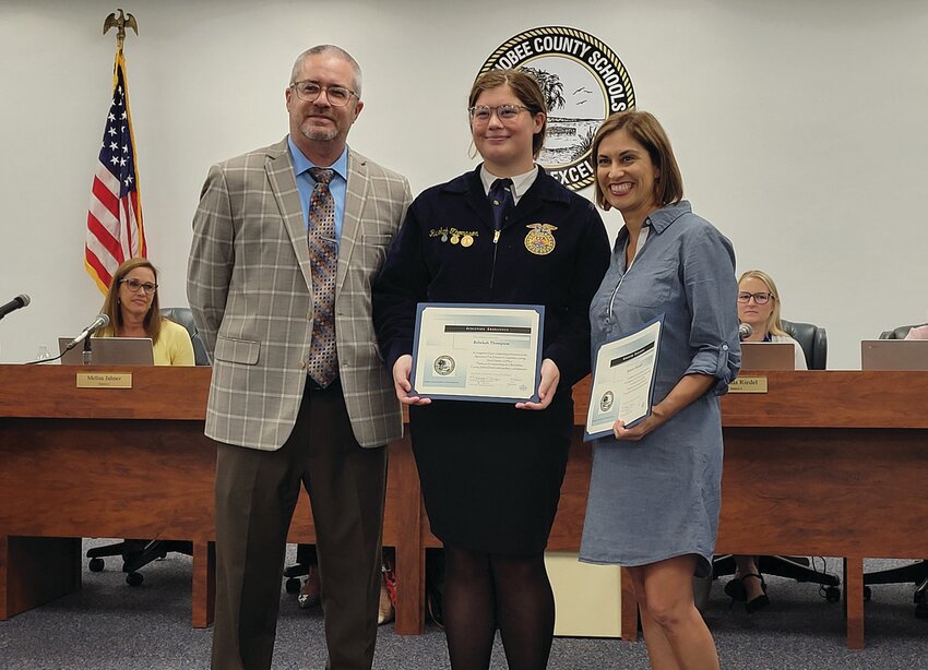 OKEECHOBEE — OHS FFA Student Rebekah Thompson placed second in Social Systems at the State Agriscience Fair. From left to right are Superintendent Tedders, Rebekah Thompson and her advisor Megan Williamson.