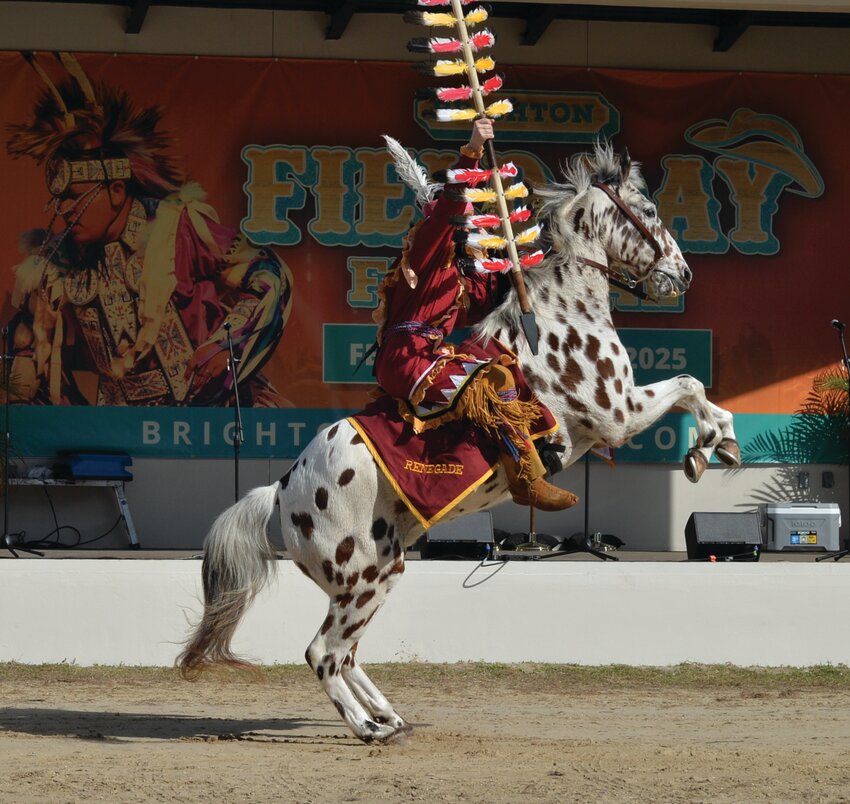 BRIGHTON -- Florida State University macot Osecola and his horse Renegade led the parade at Brighton Seminole Festival on Feb. 15. [Photo by Katrina Elsken/Lake Okeechobee News]