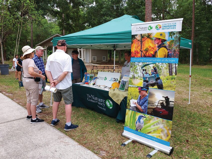The Nature Conservancy - Tiger Creek Preserve is a regular exhibitor at park festivals and has added interactive activities for young people.  Earth Day Festival 2023. [Photo courtesy Highlands Hammock State Park]