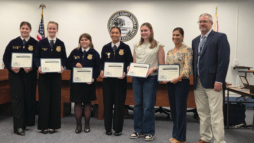 OKEECHOBEE — From left to right are OHS FFA Milk Quality and Production Team Rachel Thompson, Lilly Larson, Hannah Butler, Sophia Caves, Coach Allison Jackson, Advisor Megan Williamson with Superintendent Dylan Tedders.