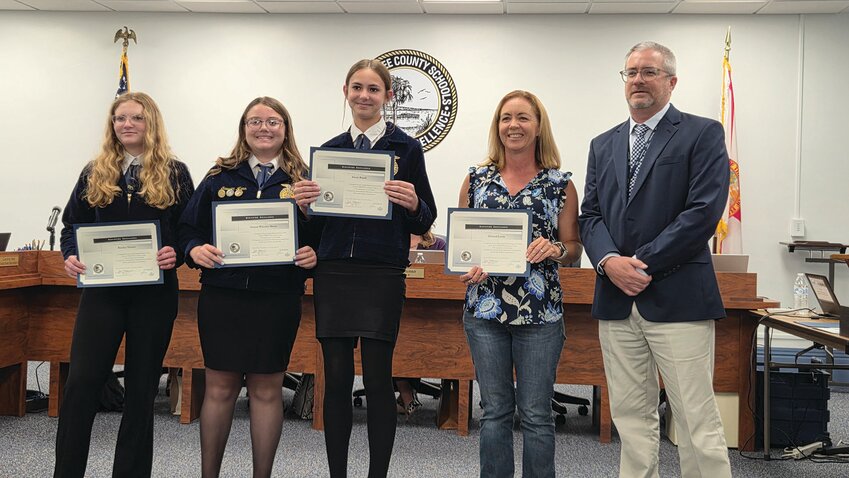OKEECHOBEE — From left to right are YMS FFA Livestock Team members Kinsley Vinson, Sawyer Wheely-Mann, Alexis Bandi, Coach/Advisor Christal Lewis and Superintendent Dylan Tedders.