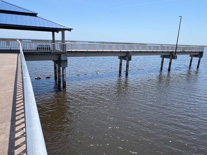OKEECHOBEE -- Concrete reef balls are visible along the edge of the pier at the Clif Betts Jr. Lakeside Recreation Area (Lock 7). [Photo by Katrina Elsken/Lake Okeechobee News]