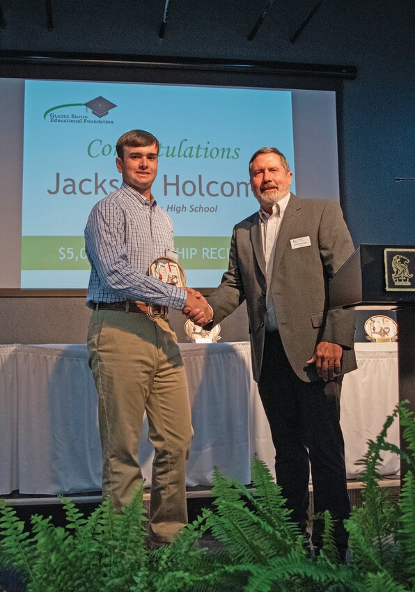 Jackson Holcomb was presented a $5,000 scholarship by CEO of Glades Electric Cooperative. [Photo courtesy Glades Electric Cooperative]