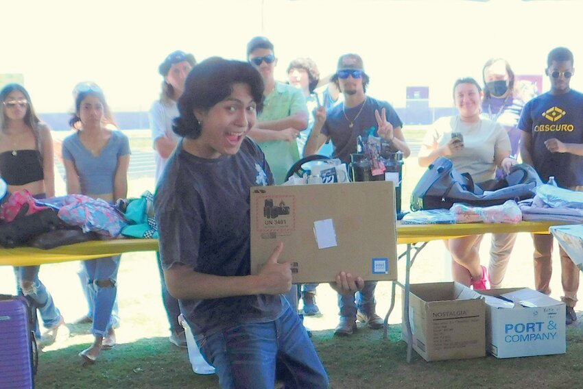 This photo was taken at a prior Grad Party. Gifts are purchased using donations from community members, organizations, and Children’s Services Council.  [Courtesy photo]