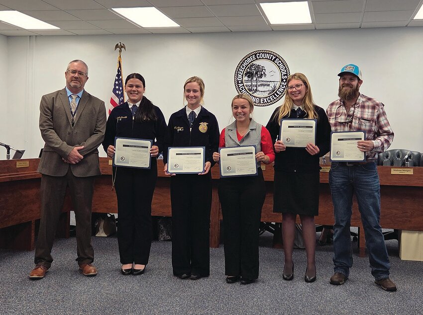 OKEECHOBEE — From left to right are Superintendent Dylan Tedders with the OHS Livestock Evaluation Team members Isabella Carrillo, Lilly Larson, Hailey Harden, Lila Bishop and their coach Jared Prescott.