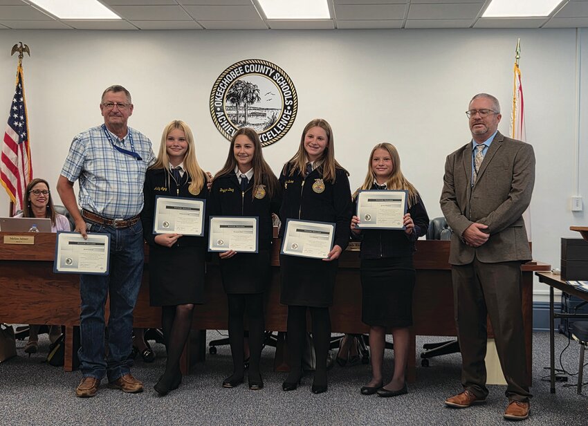 OKEECHOBEE — From left to right: the OMS FFA Dairy Judging Team Coach Jacob Larson with team members Addyson Lyng,  Brylynn Diaz,  Lexi Bishop, Jand enna Walpole with Superintendent Dylan Tedders (right).