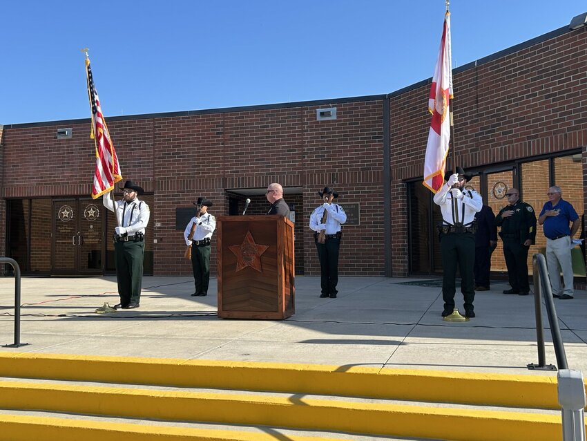 At 9 a.m. on May 15 in front of the Okeechobee County Sheriff’s Office, Okeechobee City Police Chief Donald Hagan welcomed everyone to the ceremony and led the crowd in the Pledge of Allegiance after a Presentation of the Colors by the Honor Guard.