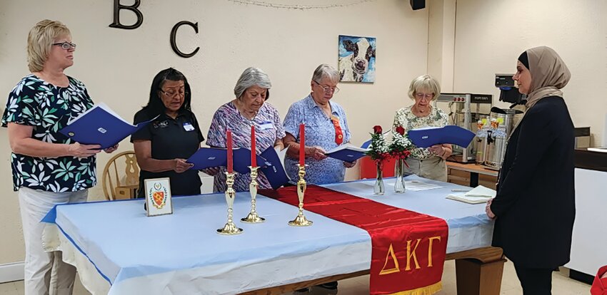 DKG members Left to right: Lori Howard, Linda Vaughn, Susie Fogarty, Marilyn Rinear , Judith Mix and new initiate Manal Yamin. [Photo courtesy Delta Kappa Gamma Beta Nu Chapter]