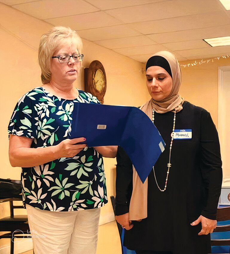 Left to right:  Lori Howard and Manal Yamin  [Photo courtesy Delta Kappa Gamma Beta Nu Chapter]