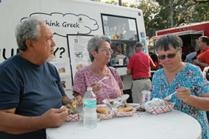 LaBelle residents Tom Sagamang, Nena Stewart, and Margret Englend ate their Mediterranean cuisine outside Port St. Lucie&rsquo;s Think Greek food truck in Barron Park on Thursday, April 6. (Submitted photo/Anthony Narehood)
