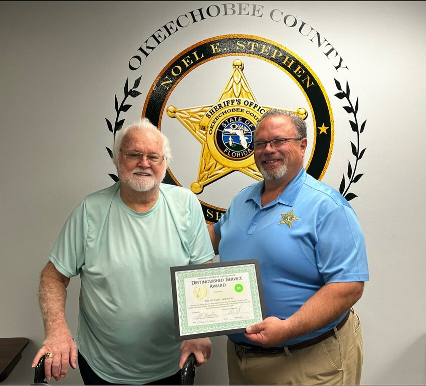 Rev. Dr. Paul Jackson Sr. was presented the Distinguished Service Award by Sheriff Noel E. Stephen on behalf of the Florida Sheriff's Association for 25 years of continued support.