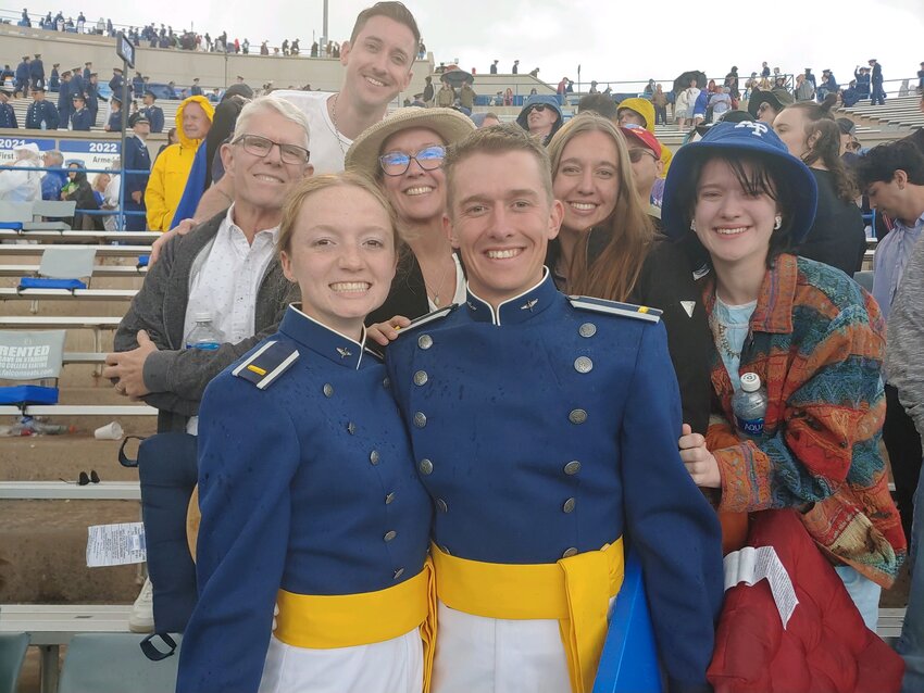 Stephanie and Nathaniel Bean are pictured with Nathaniel's parents and siblings after the couple's graduation from the United States Air Force Academy.