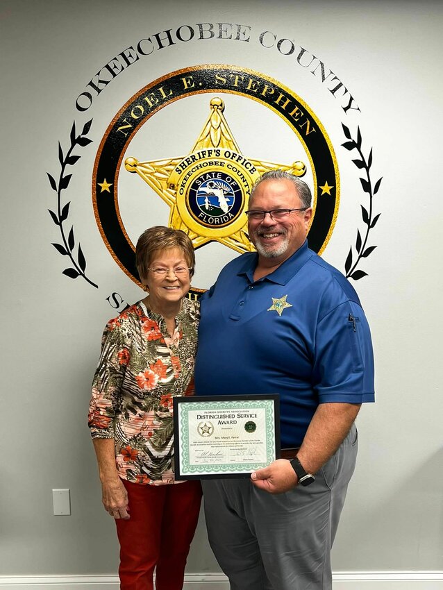 OKEECHOBEE &mdash; Let us talk about dedication. Forty-five (45) YEARS of service!   That is 394,200 minutes or 16,425 hours. Longer than some of you are old.  Did that set in?   This is how many years Ms. Mary Farrar has been donating to the Florida Sheriff's Association.  Miss Mary received an extraordinary Distinguished Service Award presented by Sheriff Noel E. Stephen on behalf of the FSA.