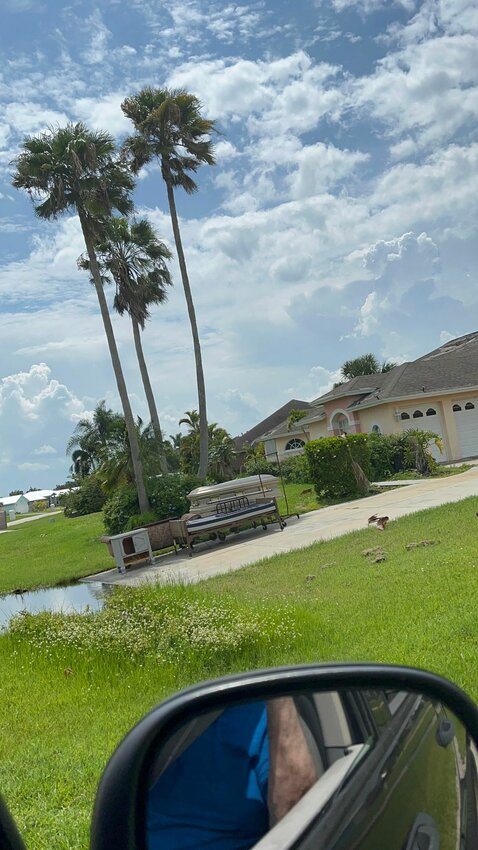 Residents  in the Blue Heron Golf Course community were surprised Friday morning to spot a coffin in the driveway of what they thought was a vacant home. The Okeechobee County Sheriff's Office showed up to investigate the situation soon after this photo was taken.