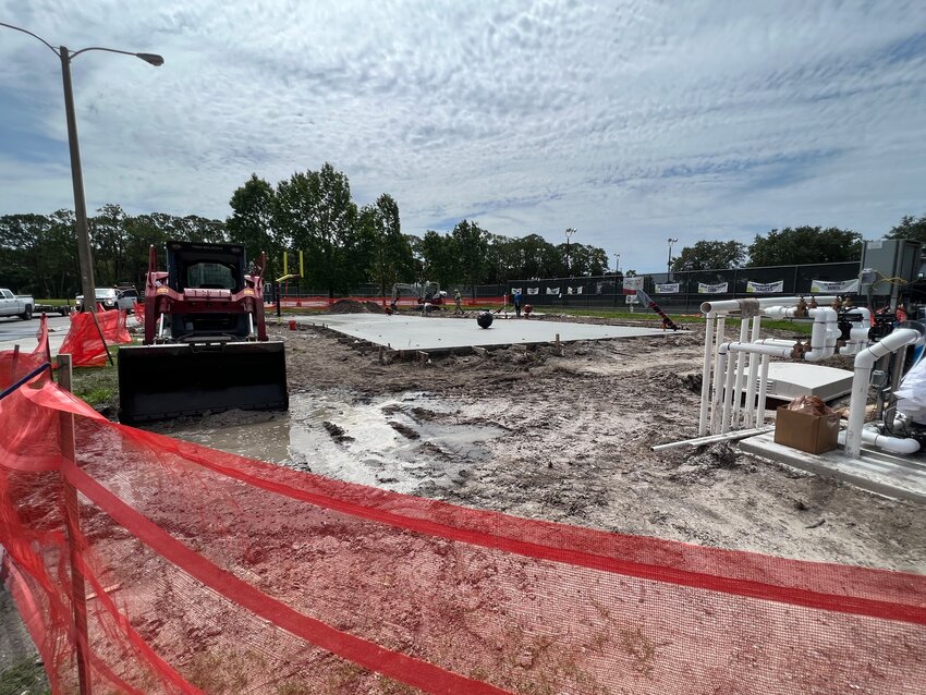 OKEECHOBEE -- Work continues on the long-awaited splash pad at the Darrel Enfinger Sports Complex, 640 N.W. 27th Lane. The splash pad is expected to open sometime in July.