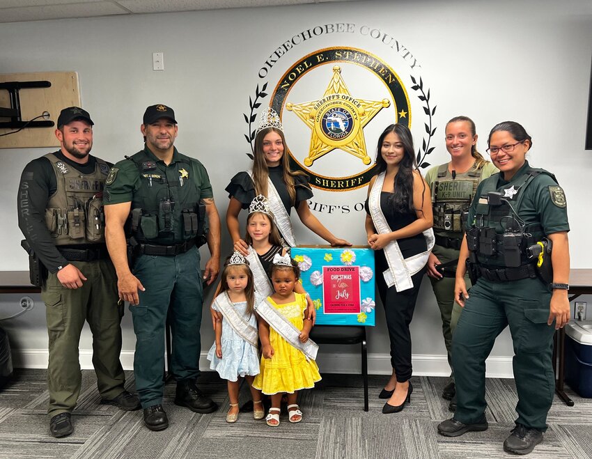 Today our deputies received our collection box for non-perishable foods going to Our Village by Crowns For A Cure - Christmas In July.     These amazing young ladies are asking for you to grab just one item of non-perishable food items and drop them off here at 504 NW 4th St. (Okeechobee County Sheriff/Admin Side), and we will make sure, once full, it's delivered back to them.