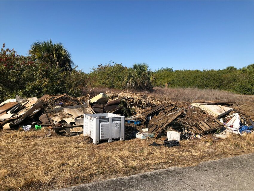 Debris collects in a desolated area in Hendry County.