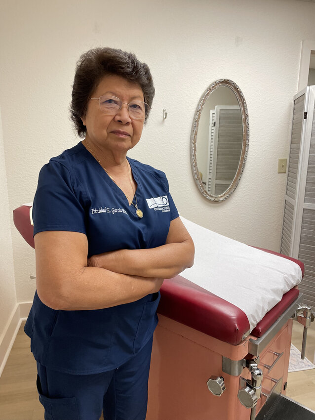 &quot;I wouldn't want to just sit around twiddling my thumbs,&quot; said Dr. Trinidad Garcia when asked why she volunteered at the Pregnancy Center after her retirement.